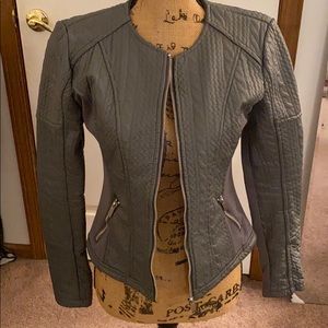 Grey leather jacket.
